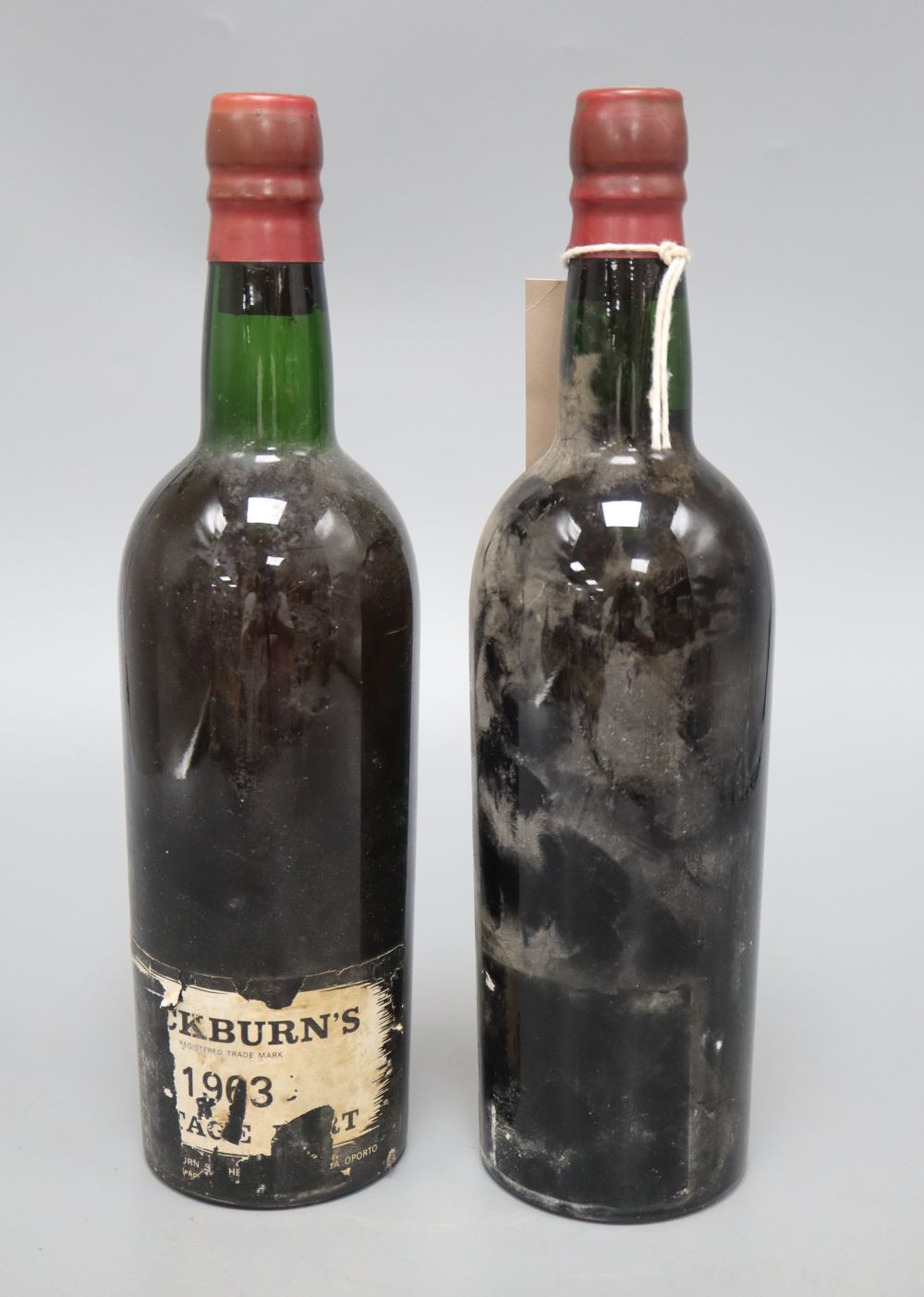 Two bottles of Cockburns 1963 Vintage port